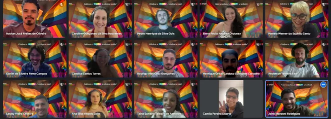 print da tela do Google meet, com os colaboradores com o fundo de tela com bandeiras da cor do arco iris